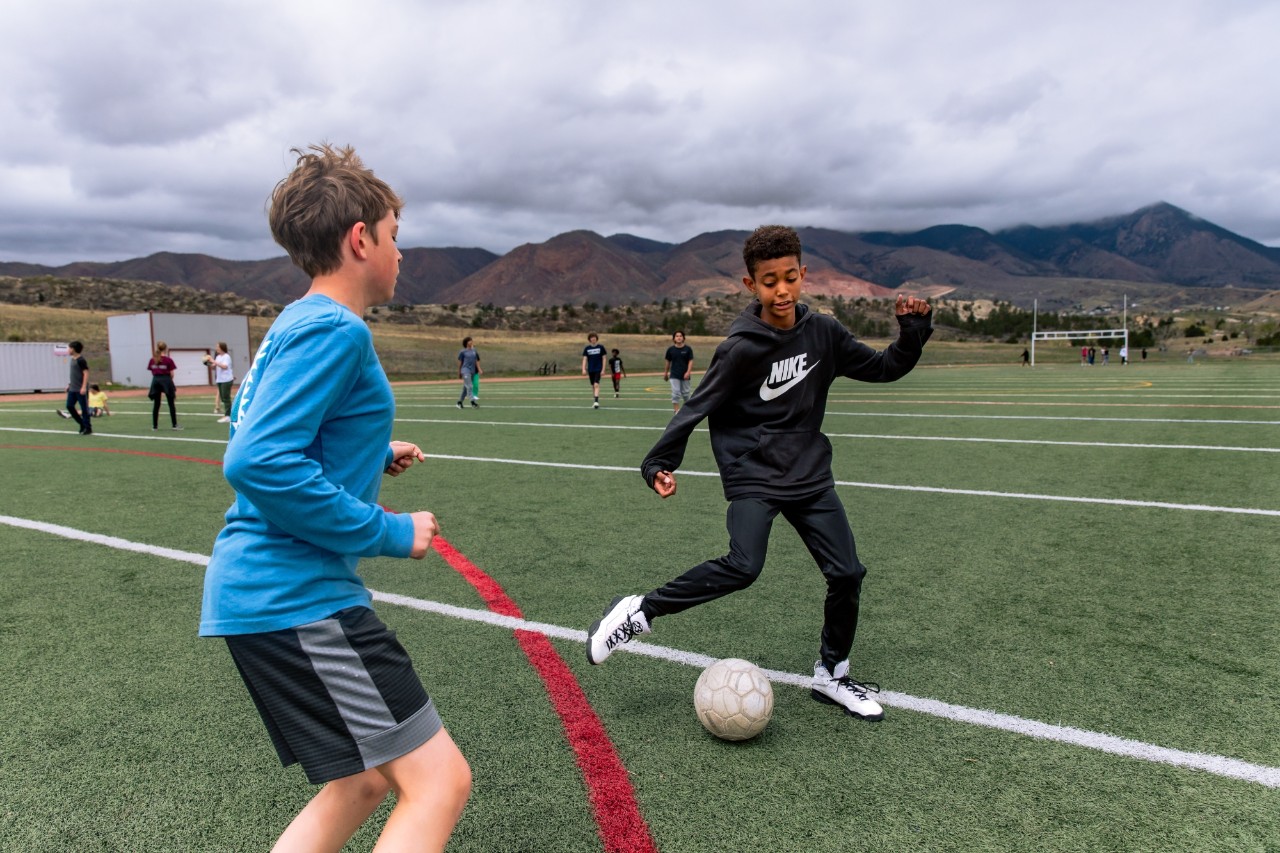 An Eagleview student practices with a soccer ball.